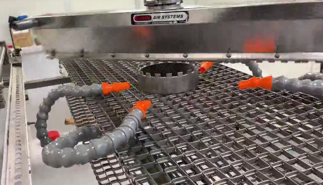 Sonic air knife system drying an automotive part on a production line