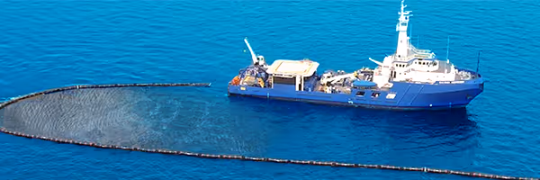 Marine oil-spill response operation at sea.