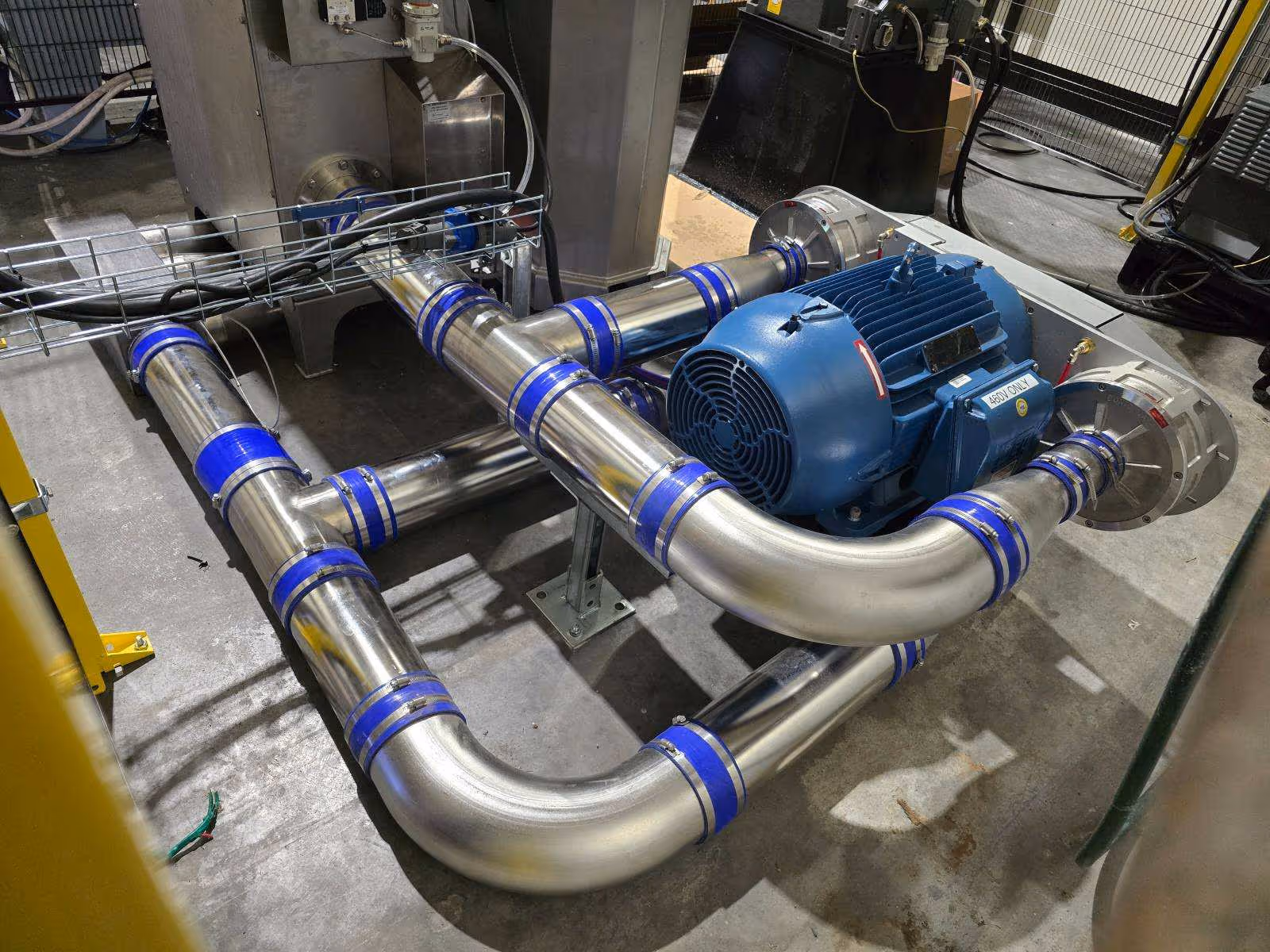 Sonic Air Systems Sonic Block industrial blower with stainless steel piping.
