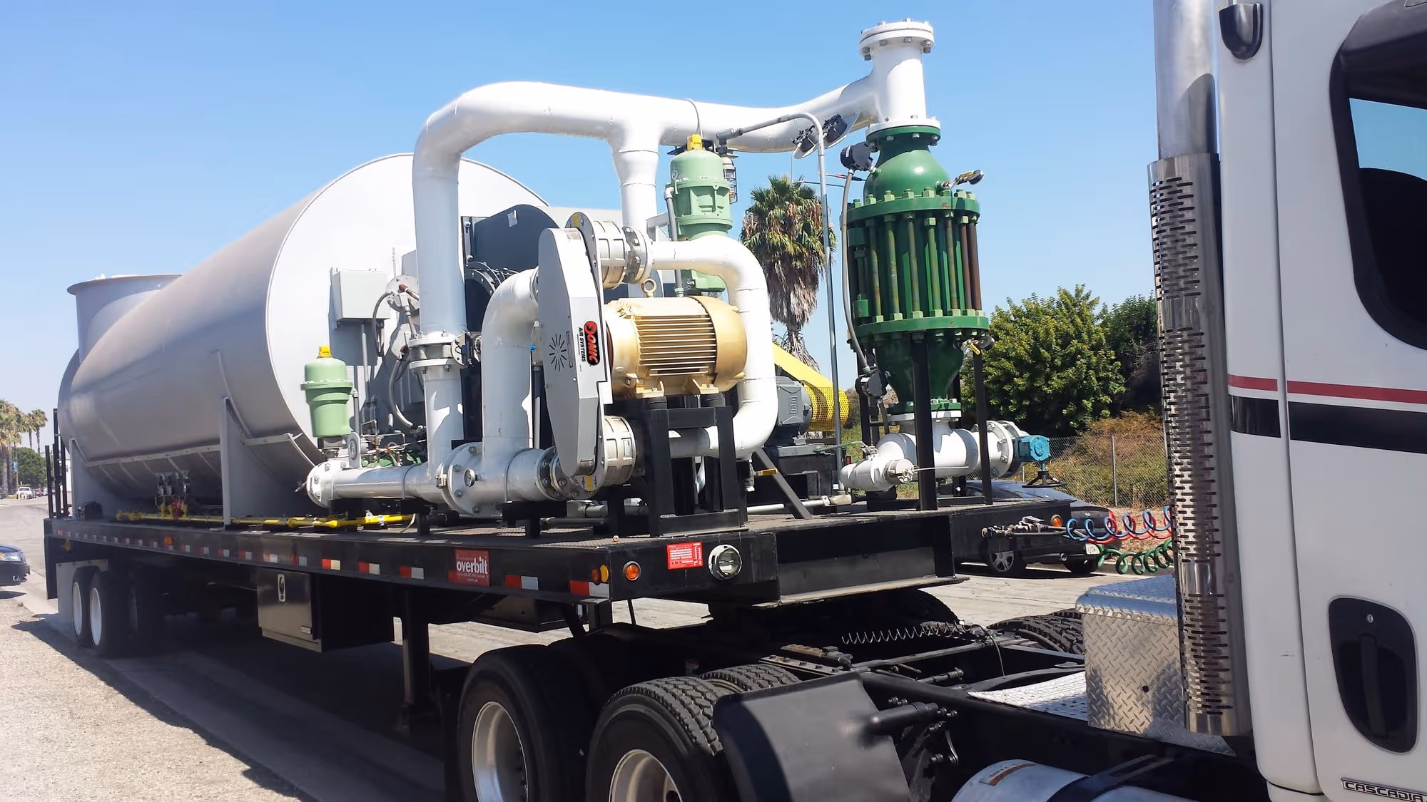 Sonic Air Systems Sonic Block industrial blower system mounted on a truck trailer.