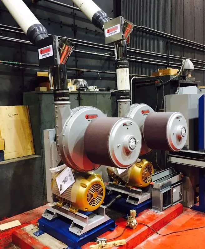 Two Sonic Air Systems industrial centrifugal blowers with gold motors and large air intake filters